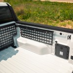 Ford Maverick with MOLLE Panels installed on the side of the truck bed.