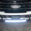 Illuminated light bar mounted for a Ford work truck for off-road and extreme conditions