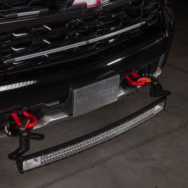 Curved 42" LED light bar mounted to the front of the Chevy Silverado