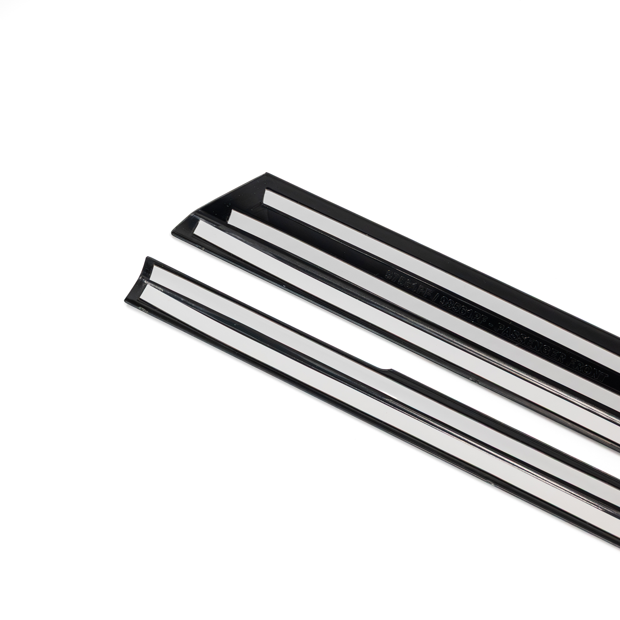 Smoke-tinted window trim accent set on side windows Smoke-tinted window trim accent set on side windows