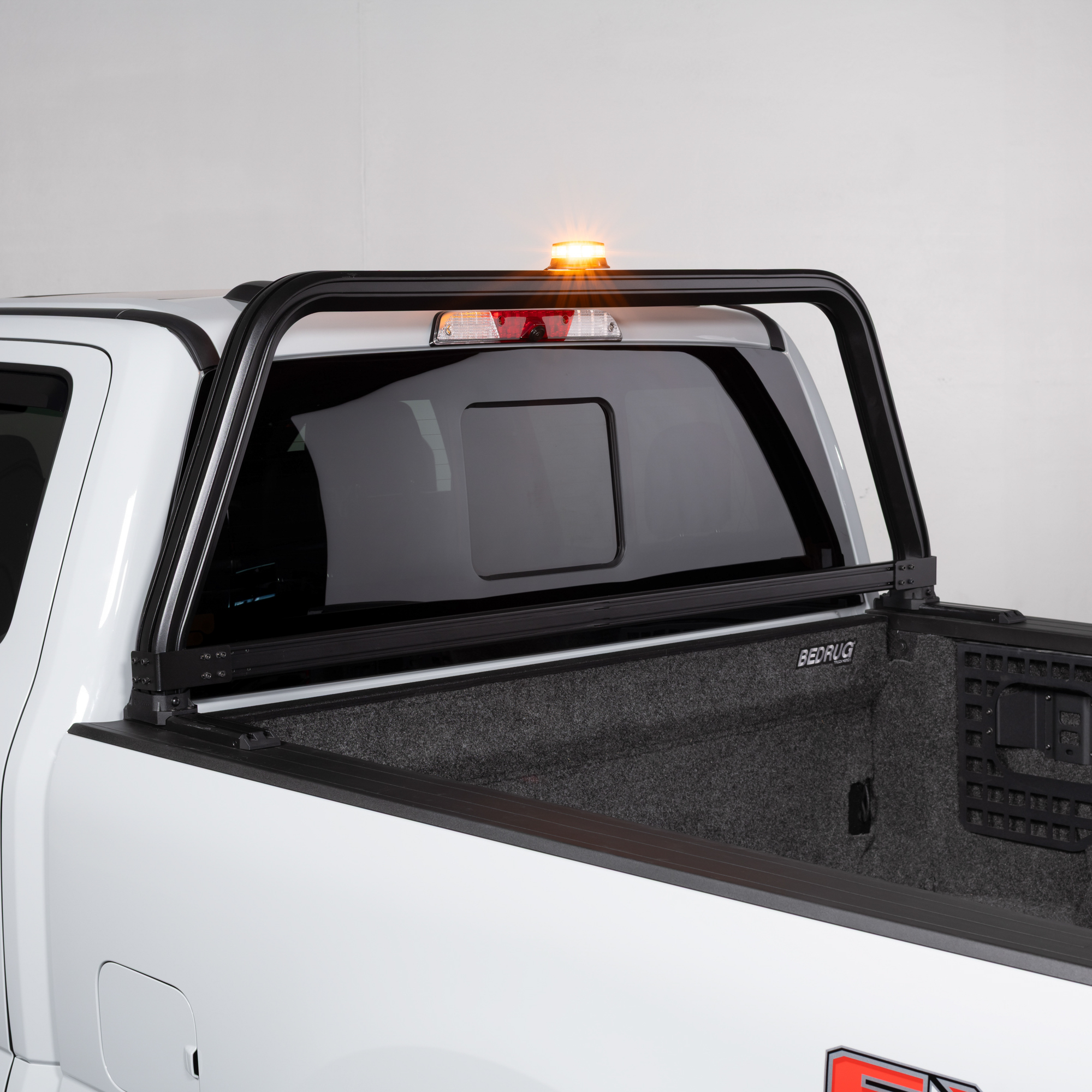 Programmable Amber/White LED Warning Beacon Mounted to Open Frame Cab Rack Programmable Amber/White LED Warning Beacon Mounted to Open Frame Cab Rack