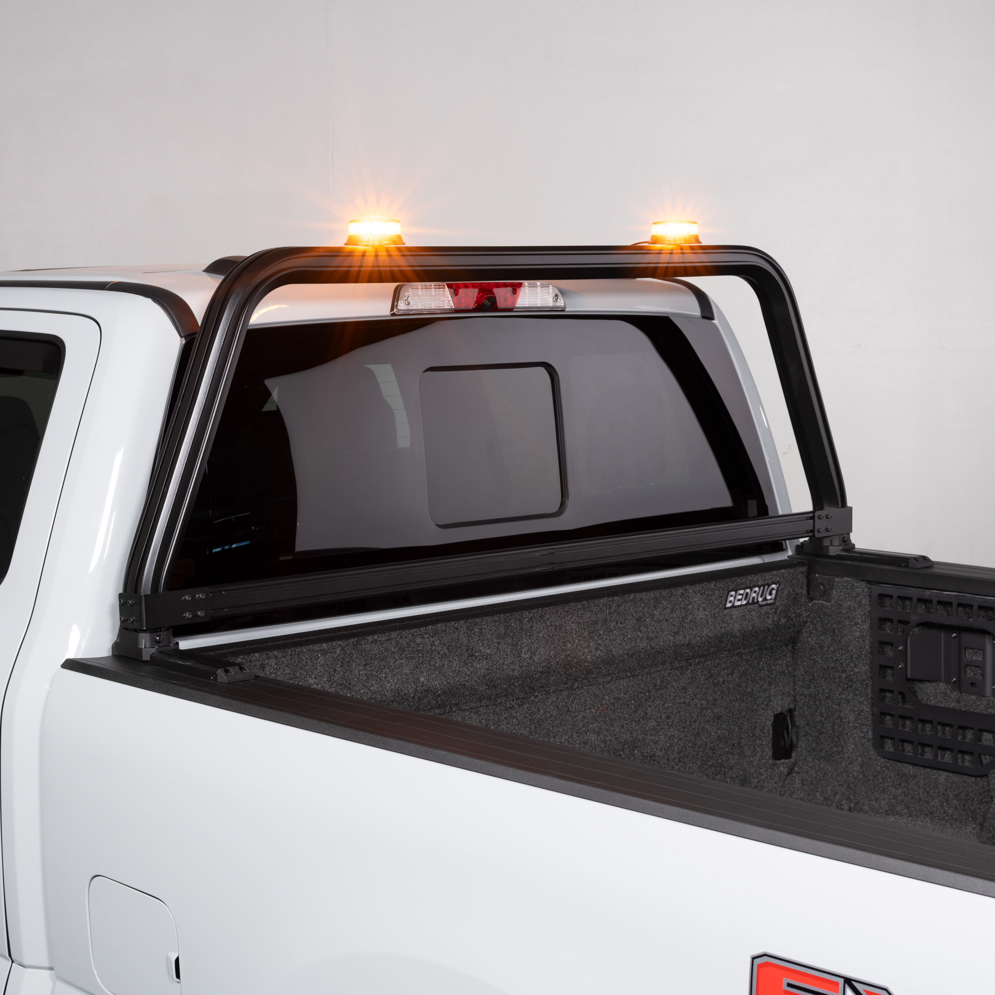 Amber and White LED Beacon for Fleet Vehicles Mounted to Open Frame Cab Rack Amber and White LED Beacon for Fleet Vehicles Mounted to Open Frame Cab Rack